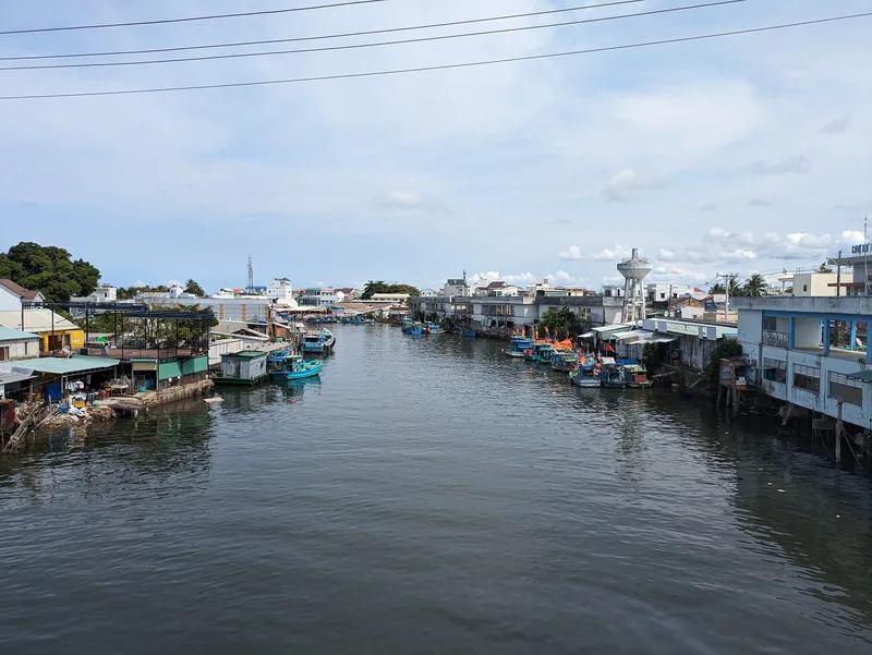 Fishing boats line the Duong Dong river canal amid waterfront homes in Phu Quoc.