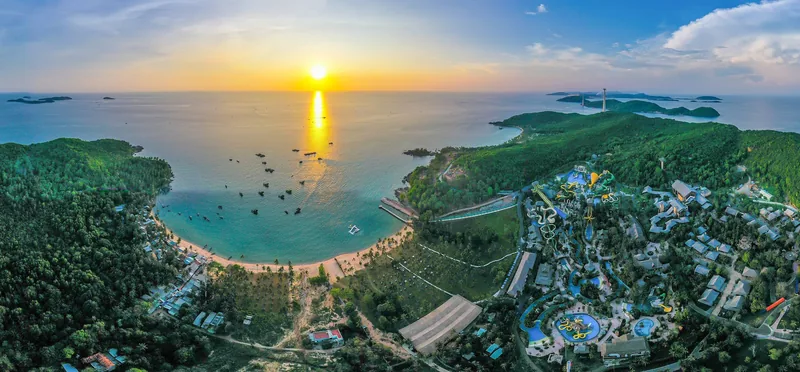 Aerial panorama of Sun World Hon Thom resort and beach at sunset in Phu Quoc
